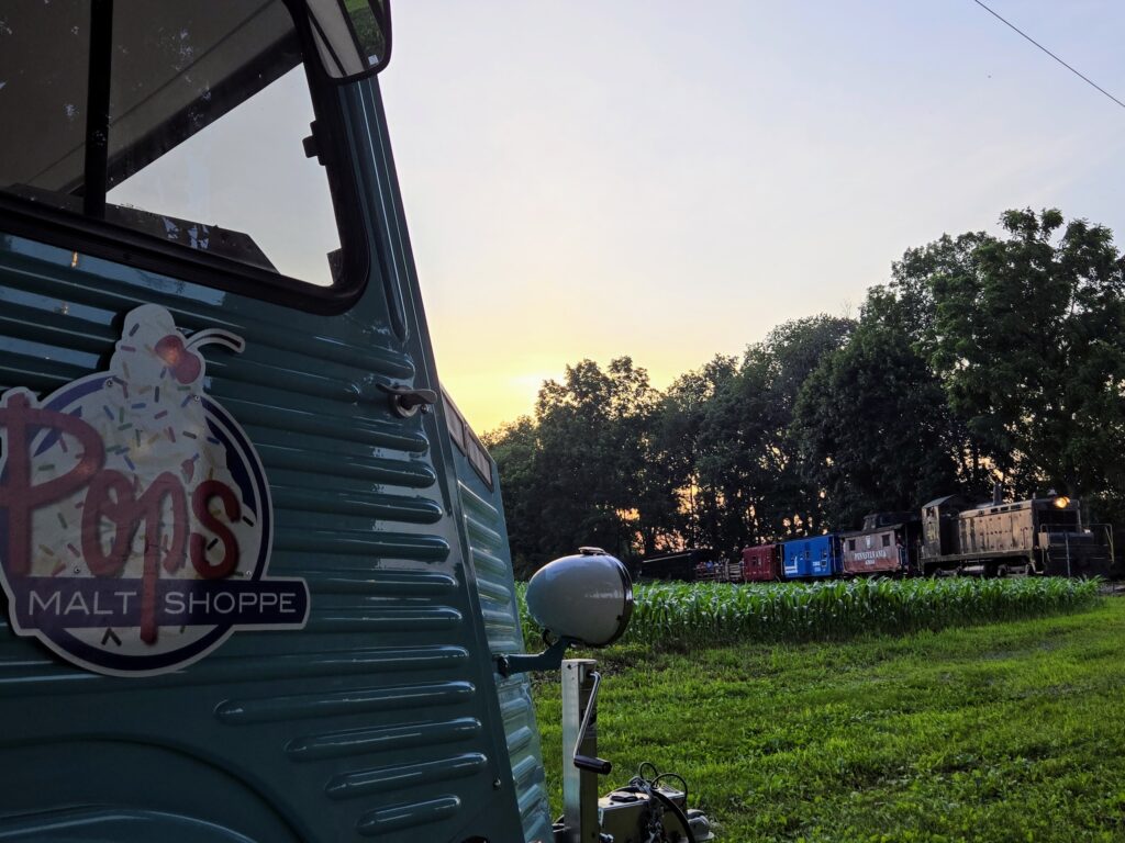 Pop's Malt Shoppe ice cream truck with passenger train.